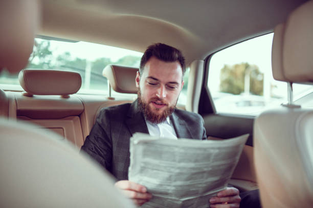 istock Newspaper Time For Businessman During Travels 1297621917