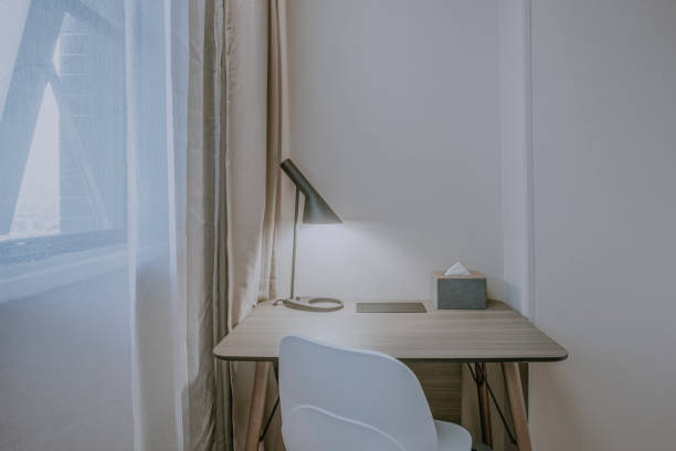 istock The comfortable and clean interior space is illuminated by tables and chairs 1297624793