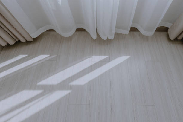 istock Shadows of curtains in the sun 1297625625