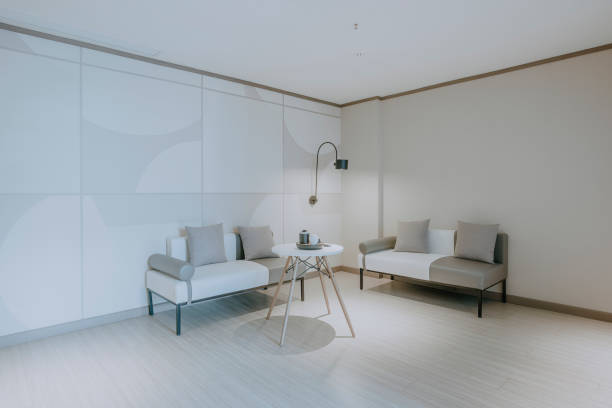 istock Comfortable and clean interior, simple space, sofa, table and chair 1297625691