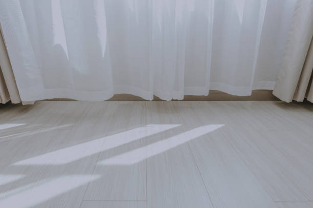istock Shadows of curtains in the sun 1297625773