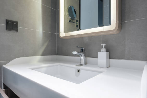 Luxury bathroom features basin, toilet in the house or home building