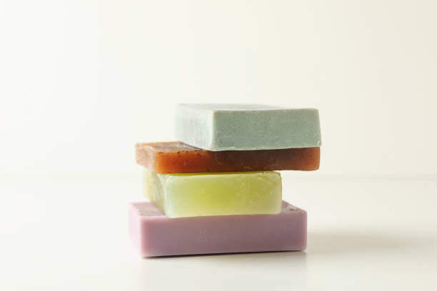 istock Pile of natural soap on white background 1297626745