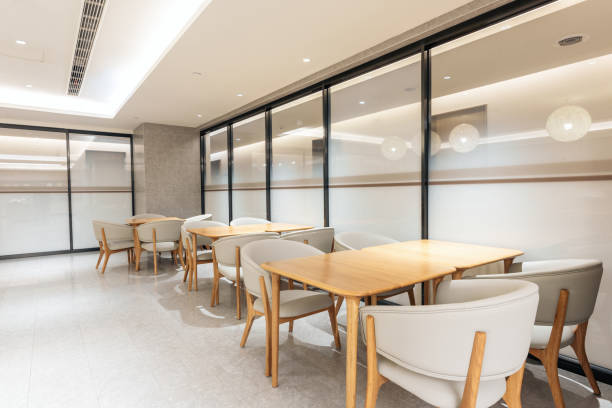 istock Yellow chairs and tables in a comfortable and tidy space 1297626840
