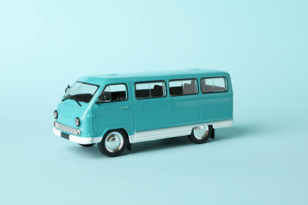 istock Toy bus on blue background, close up and space for text 1297627378
