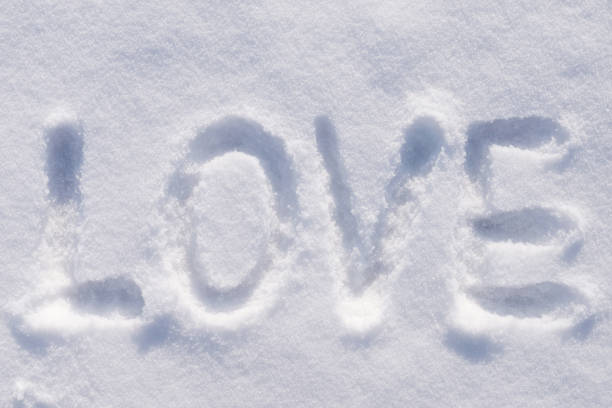 Man expressing his feelings to a girl by writing her a love message
