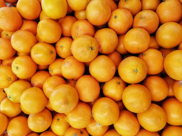 istock Fresh pile of oranges. 1297627546