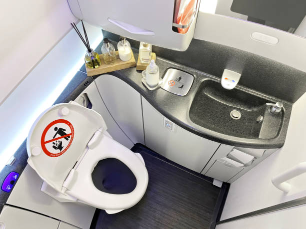 business class airplane toilet - tap airplane imagens e fotografias de stock
