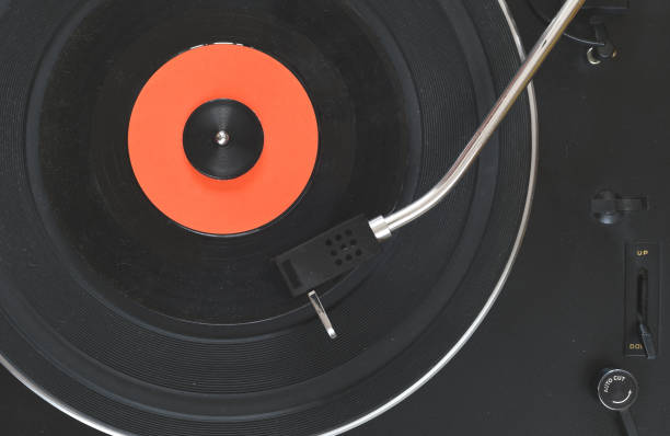 istock Top view of turntable neede on a vinyl record 1297628771