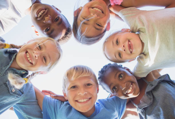 istock Multi ethnic group of children happy and smiling 1297630424