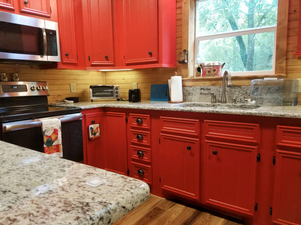 istock Kitchen in new home.  Red cabinets. 1297637389