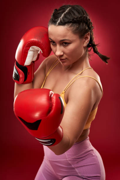 istock Boxer girl with red gloves 1297638235