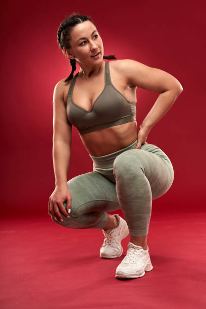 istock Plus size woman doing fitness exercises 1297638286