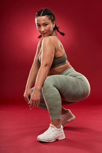 istock Plus size woman doing fitness exercises 1297638308