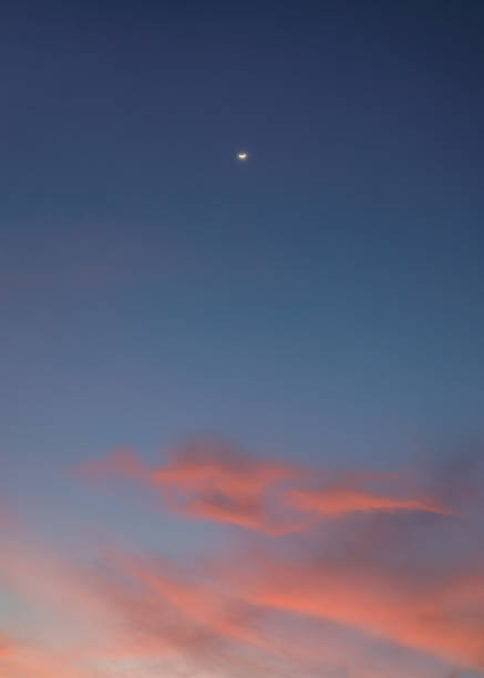 istock The crescent moon on colorful cloud in the blue sky at evening 1297641584
