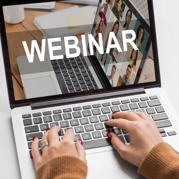 istock Beautiful female hands typing on laptop keyboard, webinar concept 1297641962