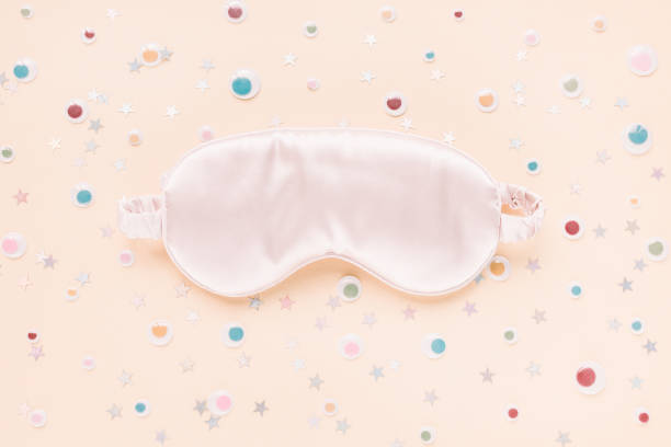 istock Sleeping mask, stars and googly eyes, insomnia concept 1297644387