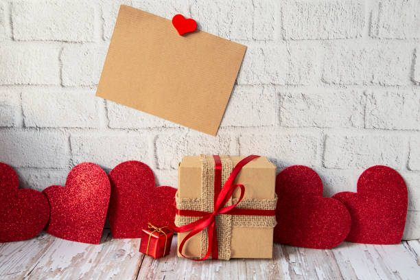 istock craft card for text on brick wall background with red valentine hearts 1297644719
