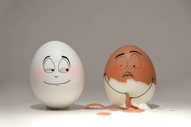 istock White and brown testicles show emotions towards each other 1297644783