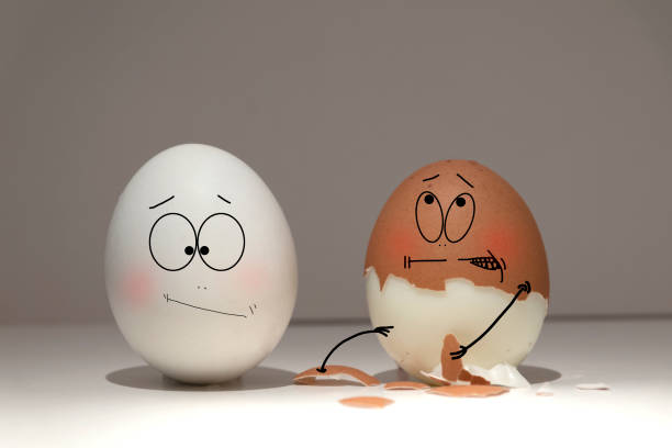 istock White and brown testicles show emotions towards each other 1297644784
