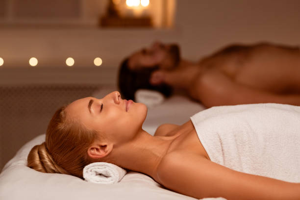 istock Spouses Resting After Body Beauty Treatment Lying In Luxury Spa 1297644830