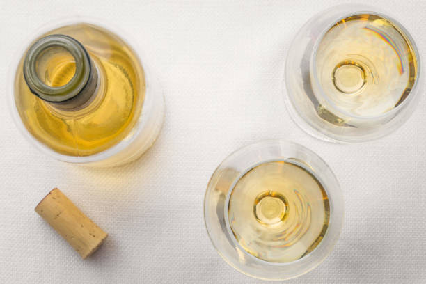 Glasses of White Wine on White Linen