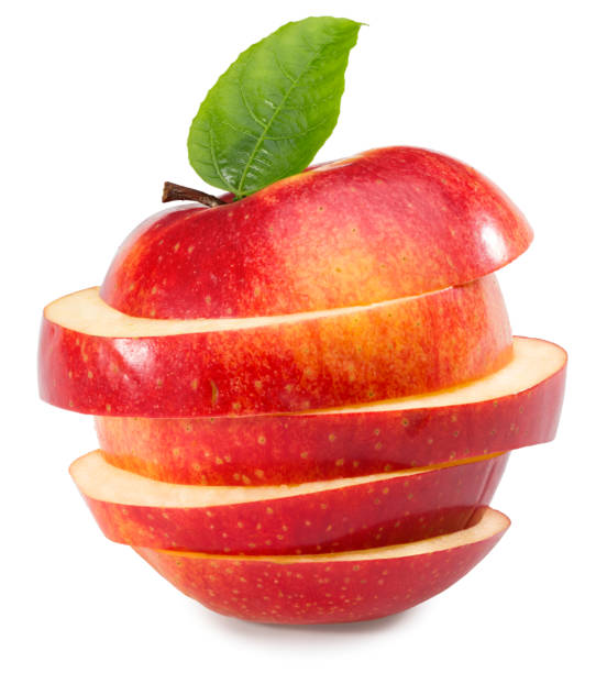 istock red apples with slices isolated on white background. clipping path. 1297646069