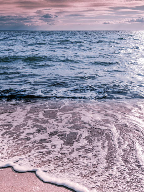 Tranquil beachscape with high tides in winter on Cape Cod, Massachusetts