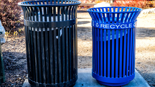 istock Blue metal recycle bin the park 1297650196