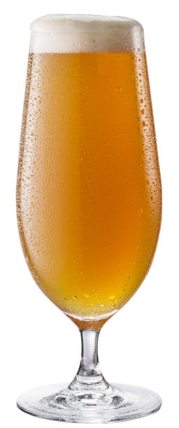 istock Beer glass isolated on a white background. Contains clipping path. White unfiltered beer. 1297653384