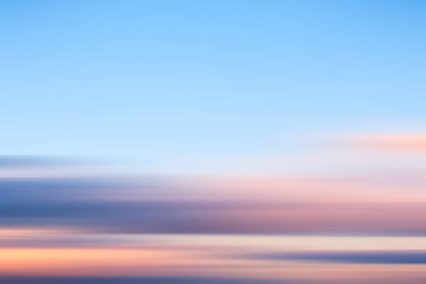 istock abstract blurred art beautiful sunset sky landscape background with flare light for design concept. 1297653609