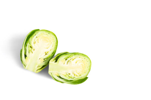 Brussels sprout halved isolated on white background, flat lay with free space