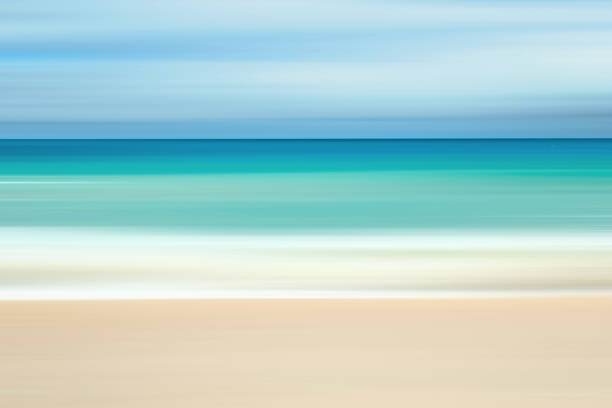 istock A seascape abstract with panning motion combined with a long exposure.  Image displays soft, pastel colors in a retro style. 1297653698