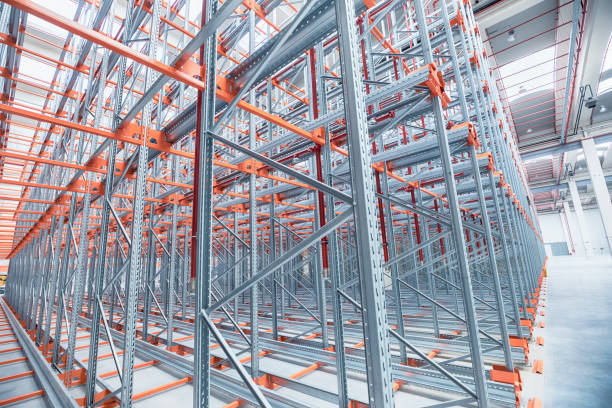 istock Industrial construction and roof in an empty warehouse 1297653890
