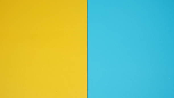 istock Empty paper in yellow and blue sky color for background. 1297654669