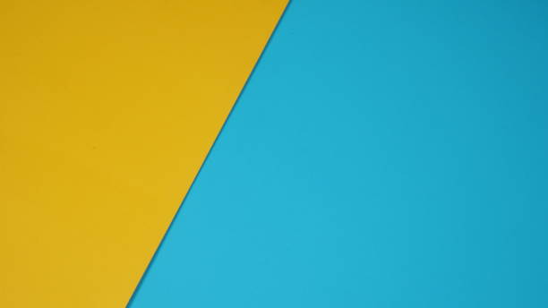 istock Empty paper in yellow and blue sky color for background. 1297654721