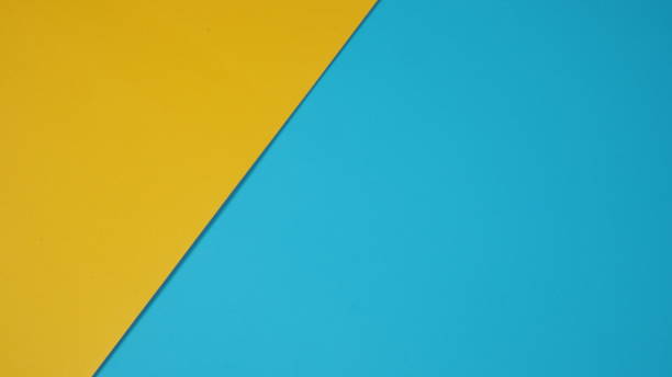 istock Empty paper in yellow and blue sky color for background. 1297654722