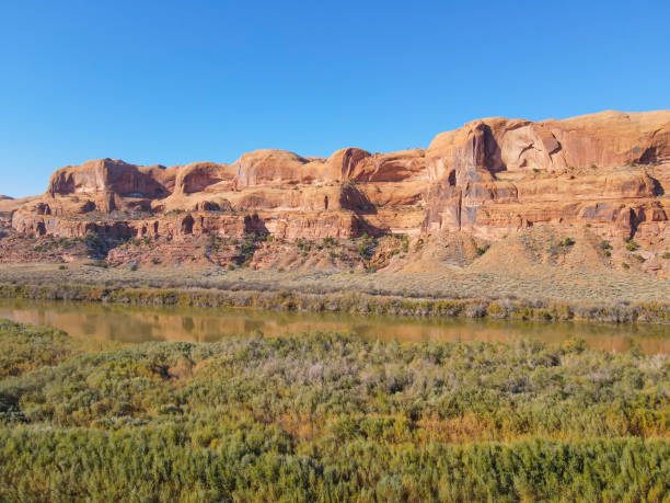 istock Scenic aerial view of Utah cliffs next to the river and forest. 1297656376