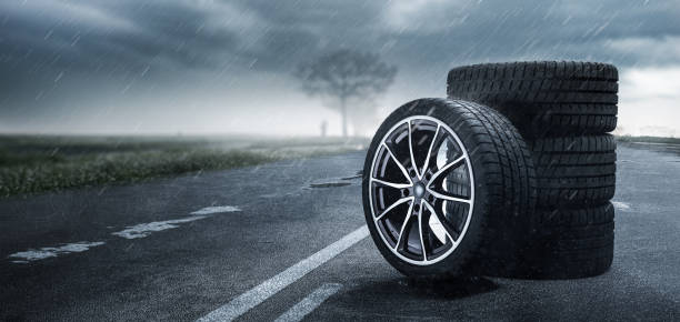 Car tires on a rainy road