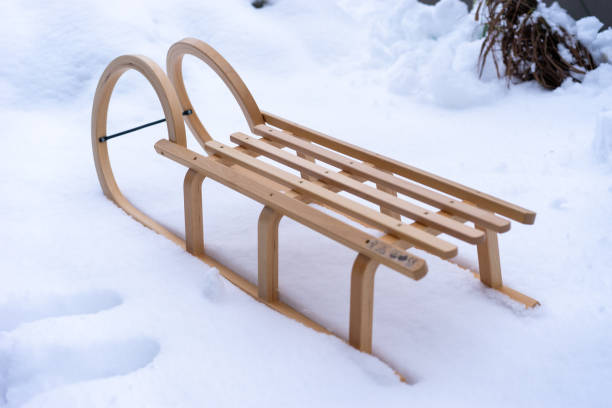 istock Wood sled set in the snow. 1297659998