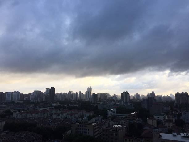 istock Crazy sky in Shanghai. The horizon above the city. Different clouds, dramatic sky, sunset. 1297660121