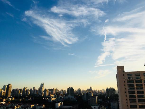 istock Crazy sky in Shanghai. The horizon above the city. Different clouds, dramatic sky, sunset. 1297660130