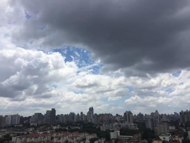 istock Crazy sky in Shanghai. The horizon above the city. Different clouds, dramatic sky, sunset. 1297660171