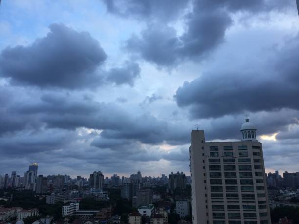 istock Crazy sky in Shanghai. The horizon above the city. Different clouds, dramatic sky, sunset. 1297660187