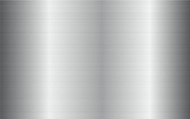 istock Brushed steel metal texture. Stainless steel technology background. Silver chrome metallic gradient 1297670393