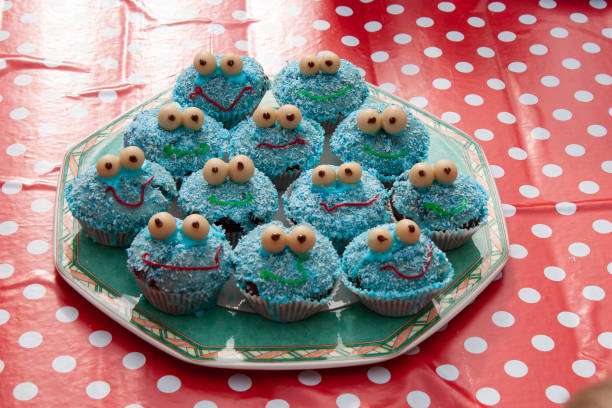 istock Birthday cupcakes on plate in the garden 1297670402