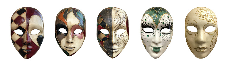 Golden Venetian carnival masks. Vintage masks on a beige background.