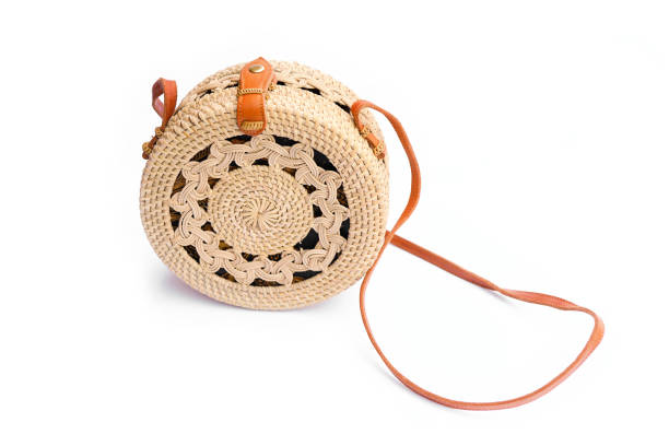 istock Handbag from Ratan on a white background. Bali style 1297674625