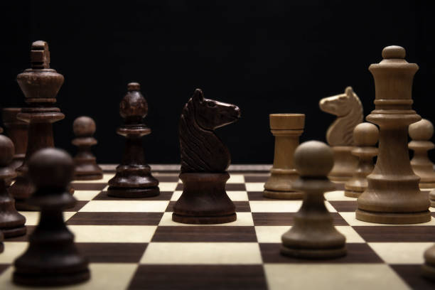 Knight in a chess duel on the chessboard