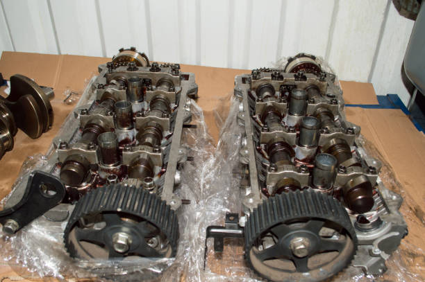 istock Two cylinder heads lie on the desktop 1297684429
